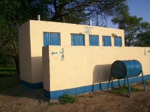 The toilet block with a hand washing tank out the front.